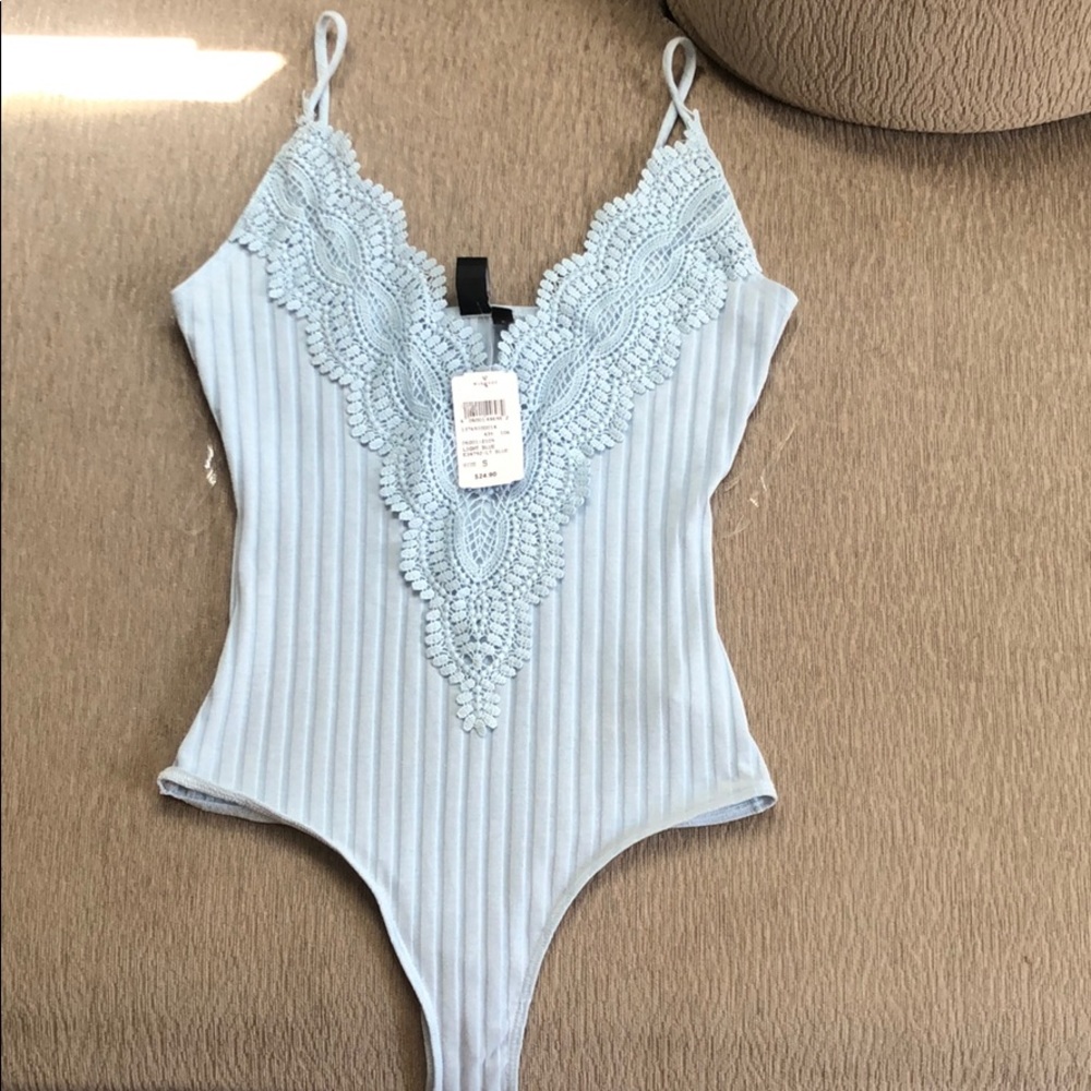 Light blue tank top/body suit